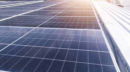 Photovoltaic solar panels mounted on building roof for producing clean ecological electricity at...