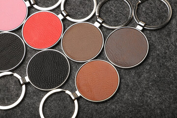 Metal and leather keychains. Colorful one side leather; Square, rectangle and circle shaped key rings. Concept shots, photos taken specially for e-commerce sales.