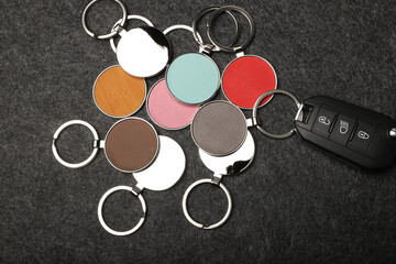 Metal and leather keychains. Colorful one side leather; Square, rectangle and circle shaped key rings. Concept shots, photos taken specially for e-commerce sales.