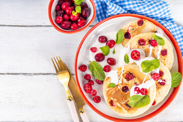 Sweet cranberry pancakes for winter breakfast