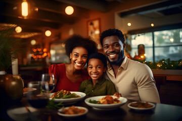 Portrait of happy African American family having dinner in restaurant, Love and warmth, Black people