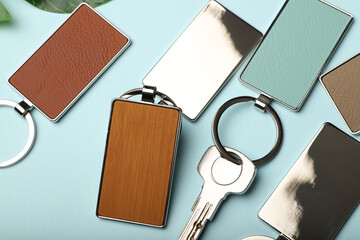 Metal and leather keychains. Colorful one side leather; Square, rectangle and circle shaped key rings. Concept shots, photos taken specially for e-commerce sales.