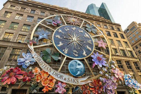 New York, NY, USA - December 9, 2023: Christian Dior and Saks have displayed this Dior's Carousel of Dreams on the Saks Fifth Avenue store during the day.