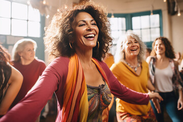 Middle-aged women enjoying a joyful dance class, candidly expressing their active lifestyle through Zumba with friends - obrazy, fototapety, plakaty
