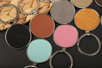 Metal and leather keychains. Colorful one side leather; Square, rectangle and circle shaped key rings. Concept shots, photos taken specially for e-commerce sales.