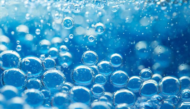 pure effervescent vitality cosmetic refreshing hygiene or hydrogen blue energy studio shot of carbonated blue gas bubbles under water in full frame macro close up with selective focus blur