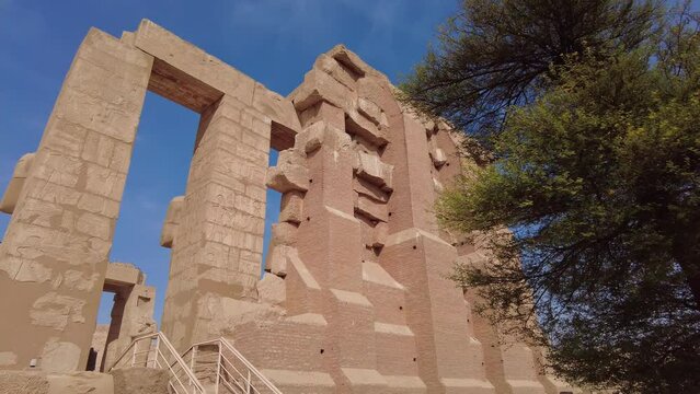 Luxor, Egypt: Exterior view of the famous Ramesseum, the memorial temple of Pharaoh Ramesses II in the Luxor westbank in Upper Egypt without any tourists around. 