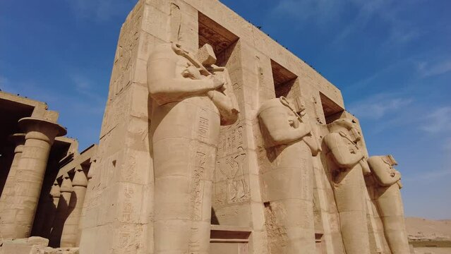 Luxor, Egypt: Exterior view of the famous Ramesseum, the memorial temple of Pharaoh Ramesses II in the Luxor westbank in Upper Egypt without any tourists around. 