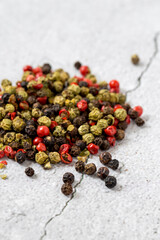 Large pile of allspice peas. Food background.Background made of middle eastern traditional spice . Top view.Textures of colorful spices and condiments.