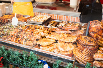 Butcher's market stall with grilled, smoked and cured meat, ham, sausages in Timisoara Romania