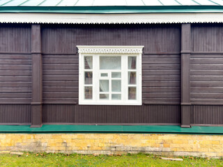 Window on a wooden wall. Background