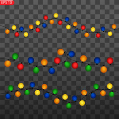 Christmas lights. Colorful Xmas garland. Vector red, yellow, blue and green glow light bulbs on wire strings isolated.