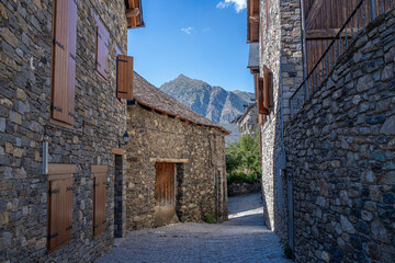 small street in taull with romanesque stone constructions in the boi valley in lleida catalonia spain - obrazy, fototapety, plakaty