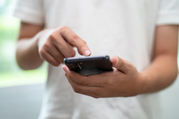 Teenage using social media with mobile phone, chat, website, shopping online.