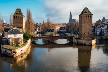 Fototapeta na wymiar Winter panorama of the famous bridges Ponts Couverts in Strasbourg, France. 