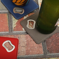 Coaster Bottle Opener, Leather Bottle Opener, top view, concept shoot, beer or drink opener and...