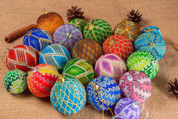 Exquisite handmade Christmas bubble toy from beads, also known as a Christmas globe or Christmas bulb, is a part of holiday decor