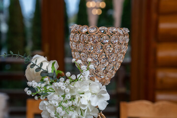 wedding table ornament with a bouquet of flowers