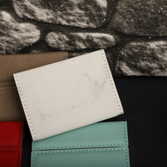 Colored leather business card holder, Genuine leather business card holder, concept shot, top view, different color, clamshell and stitched card holder