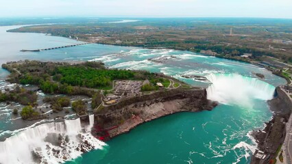 Niagara Falls powerhouse renewable energy, role sustainable power generation. Niagara Falls' might, underlines falls' contribution energy sector, Niagara Falls remains symbol natural, renewable power. - Powered by Adobe