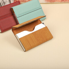 Colored leather business card holder, Genuine leather business card holder, concept shot, top view, different color, clamshell and stitched card holder