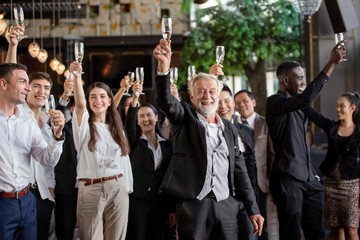 Group of business people toasting champagne to celebrate on New Year. corporate team party. happy moment together - obrazy, fototapety, plakaty