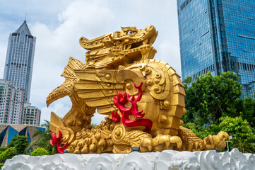 Golden sculptures of ancient Chinese gods and beasts