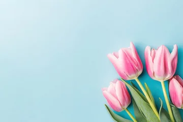 Wandaufkleber Rosa Tulpen auf blauem Hintergrund  © Sina Ettmer