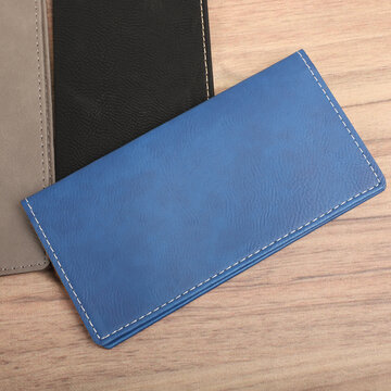 Colorful leather checkbook. Genuine leather checkbook, concept shot, top view, different color, clamshell and stitched checkbook