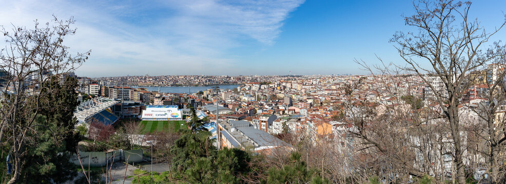 Istanbul, Turkey - April 8, 2023: A panorama picture of the Kasimpasa Stadium and the Beyoglu district of Istanbul.