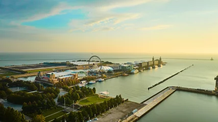 Poster Navy Pier on Lake Michigan at sunrise with aerial of Ferris Wheel at dawn, Chicago, IL © Nicholas J. Klein