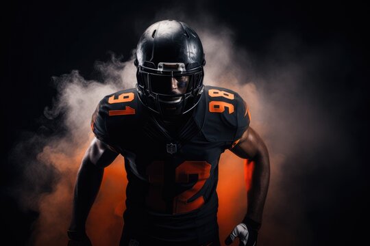 American football player in helmet and jersey on black background with orange smoke, An American football player in a helmet holding a rugby ball, AI Generated