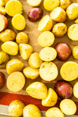 Roasting Halved Mixed Marble Potatoes in Modern Kitchen
