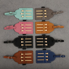 Colorful leather Golf Tee Holder. Concept shot, top view, different color. Golf tee.