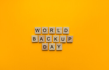 On March 31, World Backup Day, a minimalistic banner with an inscription in wooden letters