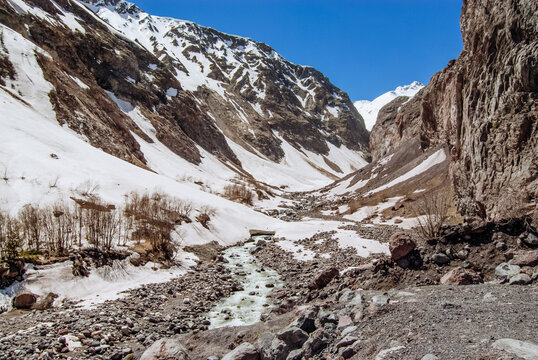 Snowy mountains, mountain river. Elbrus region, Caucasus