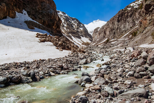 Snowy mountains, mountain river. Elbrus region, Caucasus