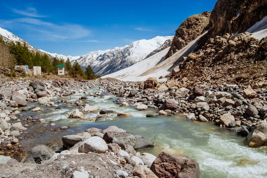Snowy mountains, mountain river. Elbrus region, Caucasus