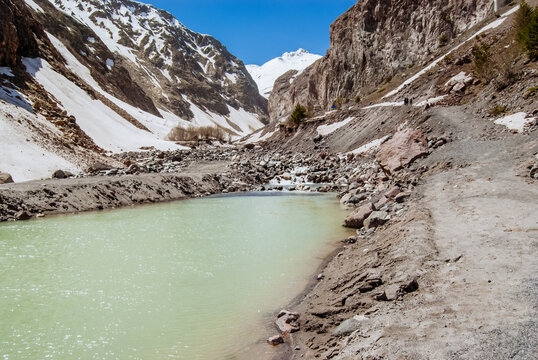 Snowy mountains, mountain river. Elbrus region, Caucasus