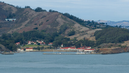 aerial landscape view across San Francisco Bay Area with Horseshoe Bay with Presidio Yacht Club and US Coast Guard Station Golden Gate located on Golden Gate National Recreation Area 
