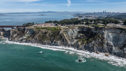 aerial landscape view of cliff area in front, on the cliff the Golden Gate Bridge Welcome Center...