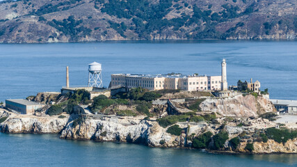 Aerial landscape view of San Francisco Bay Area with a close-up of Alcatraz Island in the middle of...