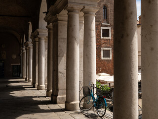 bicycle in passage with antique columns