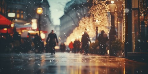 A group of people walking down a street in the rain. This image can be used to depict urban life and rainy weather