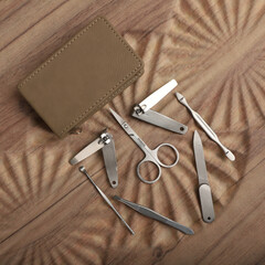 Manicure set kit in Colorful leather case. Concept shot, top view, different colors Manicure set. Special background Manicure set view.