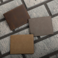 Colorful man wallet. Concept shot, top view, different colors man wallet. Special background man wallet view. Men fashion and accessories.