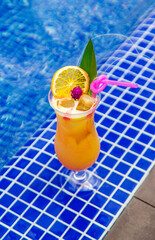 Beautiful cocktail by the pool. Selective focus.