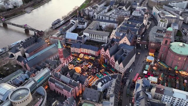Frankfurt Christmas Market, Aerial Winter Drone Shot. Weihnachtsmarkt at Romerberg Square, Frankfurt am Main, Germany.