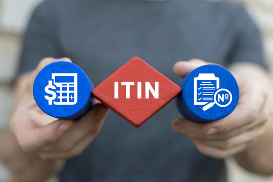 Man holding multi-colored blocks sees abbreviation: ITIN. ITIN - Individual Taxpayer Identification Number Business concept.