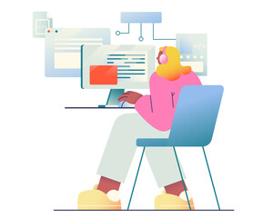 Woman sitting at desk and programming